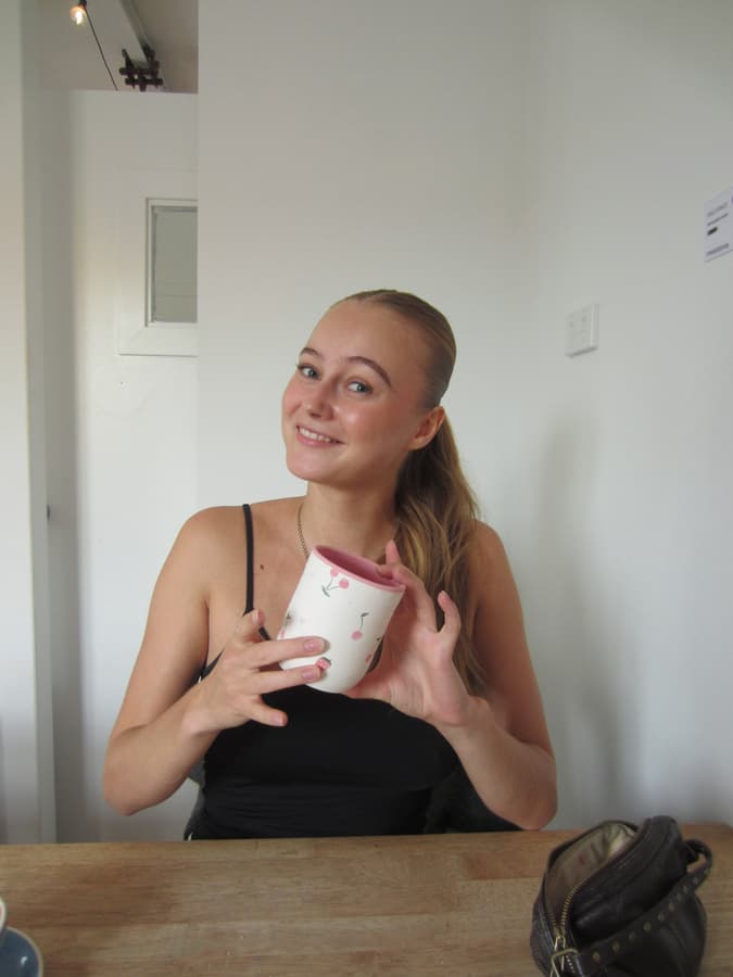 Hannah Prestegård holding a mug